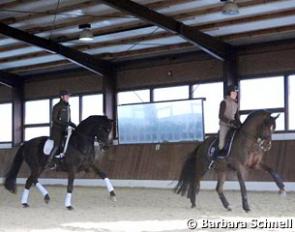 Anabel Balkenhol on Highlander and Helen Langehanenberg on Damon Hill during a winter morning training session in Rosedahl :: Photo © Barbara Schnell