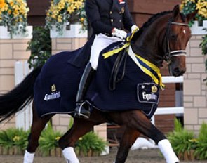 Carl Hester grabs his 60th national title at the 2012 British Championships. He did the lap of honour aboard Douglas :: Photo © Risto Aaltonen