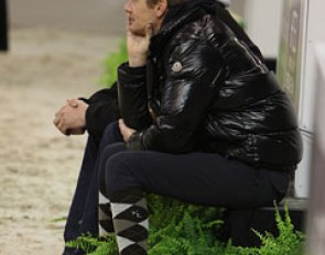 Edward Gal joins Adelinde's partner Sjaak van der Lei to watch her ride