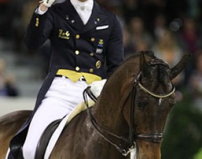 Patrik Kittel raises his fist after completing his kur on Toy Story. They rode to a new “Romeo and Juliet” themed musical score and excelled in the passage and trot extensions. The piaffe needed more sit and the two tempi's were croup high.