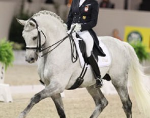 Polish Katarzyna Milczarek on her Polish bred Holsteiner stallion Ekwador (by Heraldik xx). The one tempi's were fantastic but the stallion travelled too much forward in the piaffe