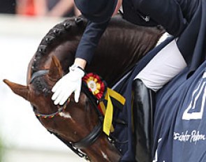 Helen gives Damon Hill a pat 