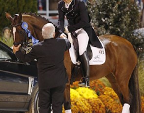 Judge Axel Steiner congratulates the 2013 CDI-W Devon Freestyle winner Lars Petersen on Mariett :: Photo © Sue Stickle