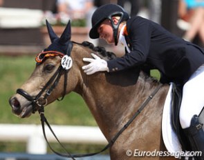 Lisanne Zoutendijk pats Champ of Class after a successful team test at the 2013 European Pony Championships :: Photo © Astrid Appels