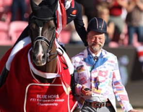 Charlotte Dujardin doing a hat swap with ringmaster Pedro Cebulka
