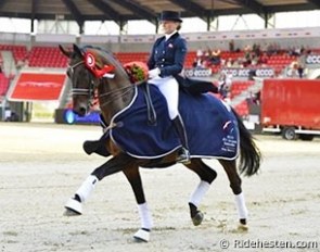 Nanna Skodborg Merrald and Millibar win the U25 Division at the 2013 European Dressage Championships :: Photo © Ridehesten.com