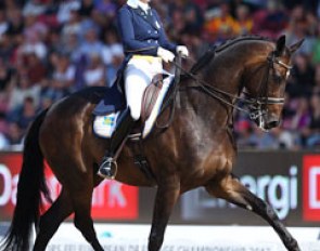 Tinne Vilhelmson and Don Auriello performed to music based on The Who's Tommy. She rode a pirouette with one hand, followed by one tempi changes and another one-handed pirouette. The passage was weak behind