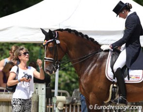 Anky van Grunsven gives a few final tips to her student Jorinde Verwimp on Tiamo