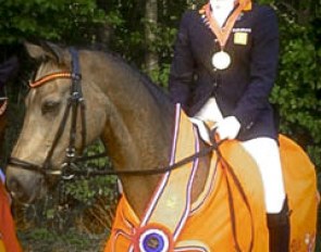 Lisanne Zoutendijk and Champ of Class win the 2013 Dutch Outdoor Pony Championships :: Photo courtesy DVB