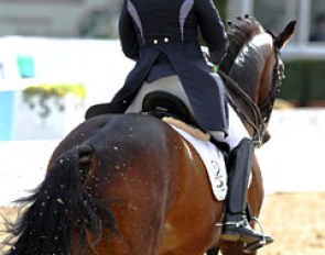 Kim Jesse is wearing an interesting tail coat riding Mieko Yagi's Charming (by Champus)