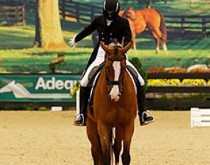Eva Oldenbroek Tabor and Uberlinies were the first competitors to trot down the centerline on the first day of competition at the 2013 U.S. Dressage Finals :: Photo © Susan Stickle