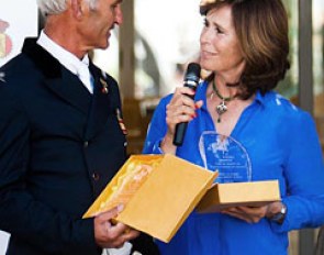 Juan Antonio Jimenez receives a prize from the Spanish Dressage Riders Club from former Spanish chef d'equipe Bobby Fernandez de Bobadilla