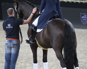 Danielle Heijkoop's Siro takes time for a stretch during the prize giving ceremony