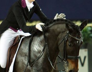 Kun pats Watson at the end of their freestyle ride