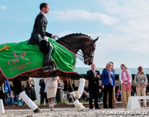 Mateus Cichon and Eldreman in their victory lap at the 2013 CDI Radionkow :: Photo © Lukasz Kowalski