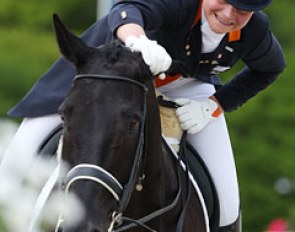 Mara de Vries is visibly pleased with her ride on Ojay and gives him a big pat and rub 
