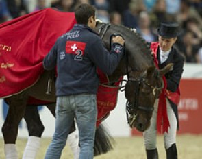 Helen's husband Sebastian lends a hand during the award ceremony