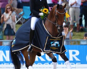 Laura Stigler and Doubleyou W won the 6-year old preliminary test at the 2013 World Young Horse Championships in Verden :: Photo © Astrid Appels