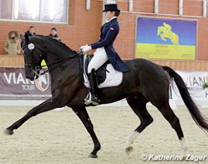 Polina Afanasieva and Tacolando Triple R in the CDI 3* Grand Prix at the 2013 CDI-W Zhashkov in Ukraine :: Photo © Katherine Zager