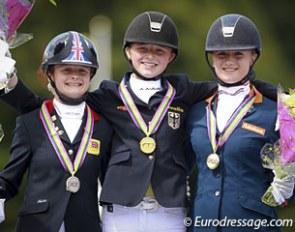 The kur podium at the 2014 European Pony Championships: Phoebe Peters, Semmieke Rothenberger, Lisanne Zoutendijk :: Photo © Astrid Appels