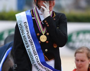 Anna Christina Abbelen in tears on the podium