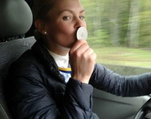 Jeanna Hogberg kisses her silver medal on her drive home from the 2014 Swedish Championships