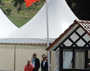Swiss youth team trainer Heidi Bemelmans watching the Swiss flag proudly as the national anthem plays