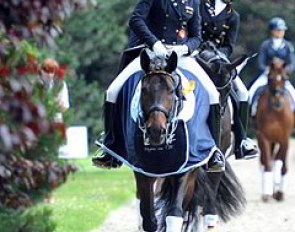 German juniors Jessica Krieg and Anna Christina Abbelen smiling to the camera after the prize giving at the 2014 CDIO-PJYR Hagen :: Photo © Barbara Schnell