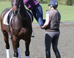 Fiona's groom mounts Orthilia for a hack