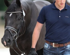 Totilas appeared very relaxed unfazed by the warm up ring and waiting horses in his surrounding