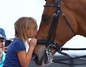 Denielle's daughter gives Argo Conti Tyme a kiss