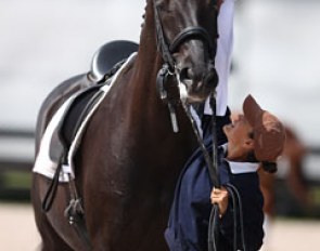 Cesar Parra's long time groom Jennifer Mandracia tries to put the ribbon on Van The Man