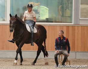 After her ride, Tina walks Calecto V bareback while chatting with Dover