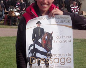 The happy fan with her signed poster
