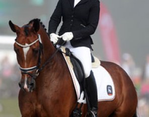 Jana Freund on the Rhinelander mare Cassiopaya (by Cassini Boy Junior). She has lovely frontleg usage but didn't have the poll as highest point in trot and got stuck in the second flying change