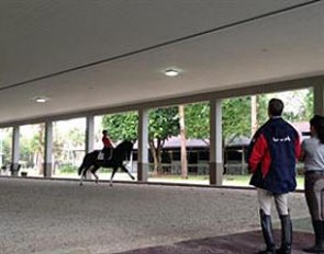 Adrienne Lyle and Wizard during a training session with USEF Chef d’Equipe/Technical Advisor Robert Dover