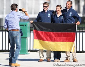 Trainer and chef d'equipe Christoph Koschel takes a snap shot of the German team, which includes Kevin Kohmann, Maria Kaldewei and Marcus Orlob :: Photo © Astrid Appels