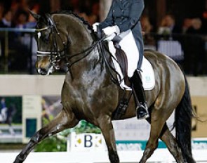 Tinne Vilhelmson and Don Auriello win the Kur to Music on Friday Night at the 2014 CDI Wellington :: Photo © Sue Stickle