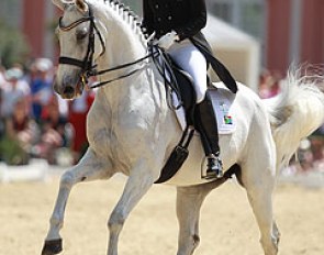 South African Chere Burger on Donna Silver. The mare has lost a lot of muscle and had a lot of unusual issues with the contact