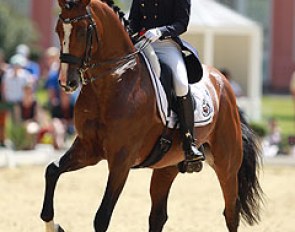 French Caroline Osmont switched to the Colombian nationality in pursuit of WEG qualification but her stallion Don Quichot struggles with the piaffe