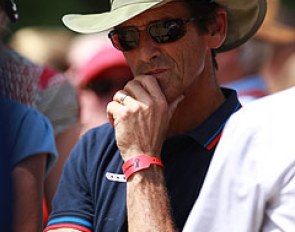 Richard White watching student Rose Mathisen ride
