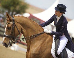 Beatriz Ferrer-Salat pats Delgado at the end of her ride at the 2015 CDI 4* Barcelona :: Photo © Arnd Bronkhorst