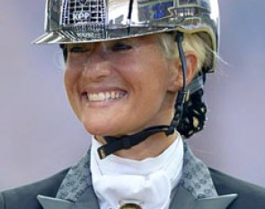 Silvia Rizzo struts the Crome Shine Silver Mirror KEP Italia helmet, which caught Valentino's attention at the 2015 CDI Doha