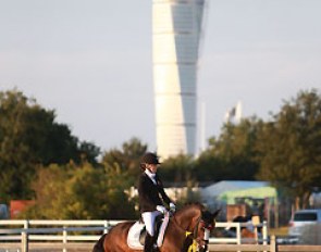 Sara van Deurs Petersen warming up Farbenfroh for the prize giving, Calatrava's "Twister Torso" building in the background