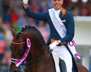 Grand Prix Special bronze medal winning Hans Peter Minderhoud and Johnson in their lap of honour at the 2015 European Championships :: Photo © Astrid Appels