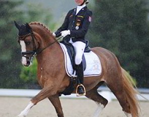 Semmieke Rothenberger competing Paso Double in the rain