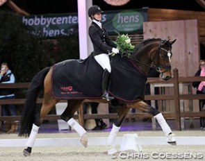 Danish Kristine Moller is all smiles as a winner at the 2015 CDI Lier World Dressage Masters :: Photo © Chris Coessens