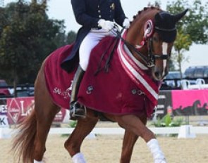 Michael Eilberg and Woodlander Farouche win the Inter I Championship at the 2015 British Dressage Championships :: Photo © Kevin Sparrow