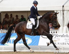 Claudia Ruscher and Florina at the 2015 World Young Horse Championships :: Photo © LL-foto