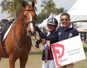 Ellen Lazarus and Rhett (left) are awarded the Piaffe Performance Adult Amateur Achievement Award, Presented by Dr. Cesar Parra of Piaffe Performance